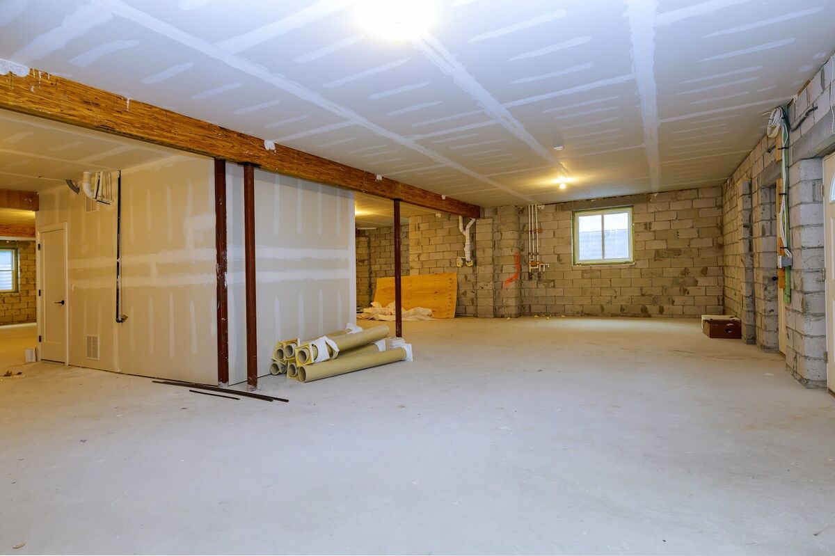 Fully stripped basement before painting job