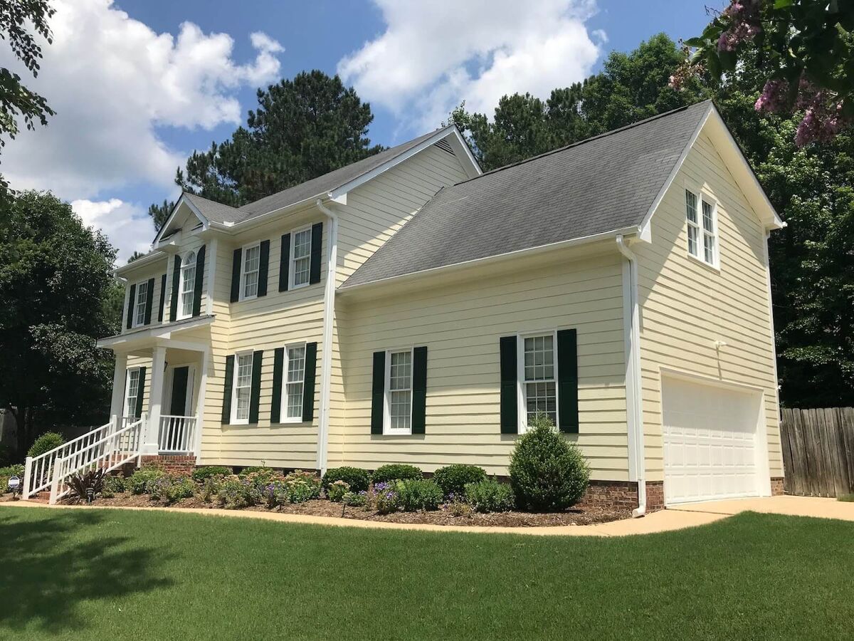 Newly painted yellow house on a sunny day.