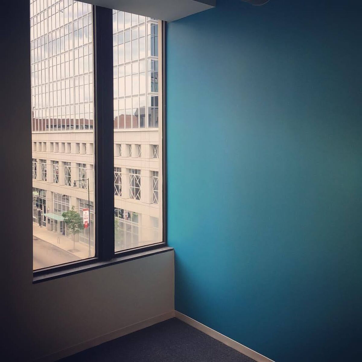 Interior of a commercial building with a blue wall